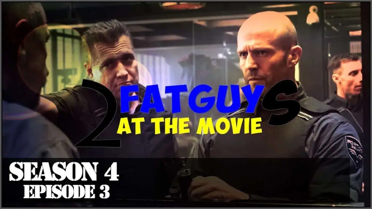 Two police officers in a tense confrontation scene from Fat Guy at the Movie.