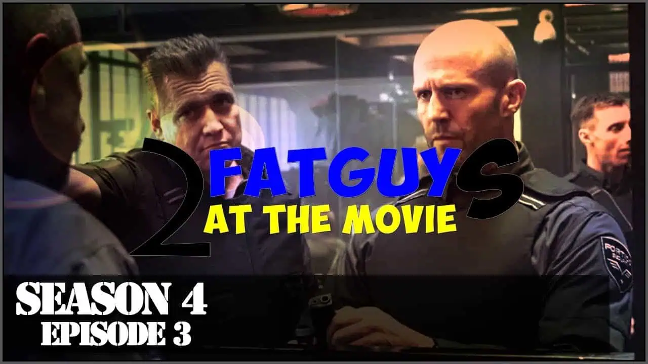 Two police officers in a tense confrontation scene from Fat Guy at the Movie.