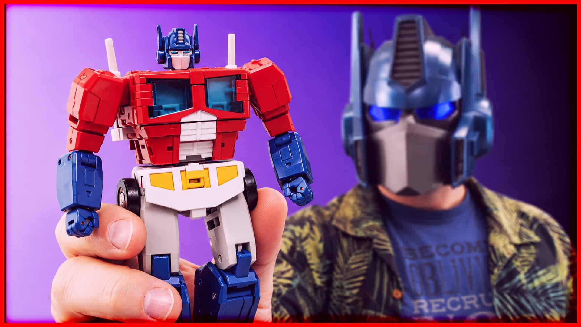 Unboxing DX9-Min Superman toy with a person wearing a Batman mask.