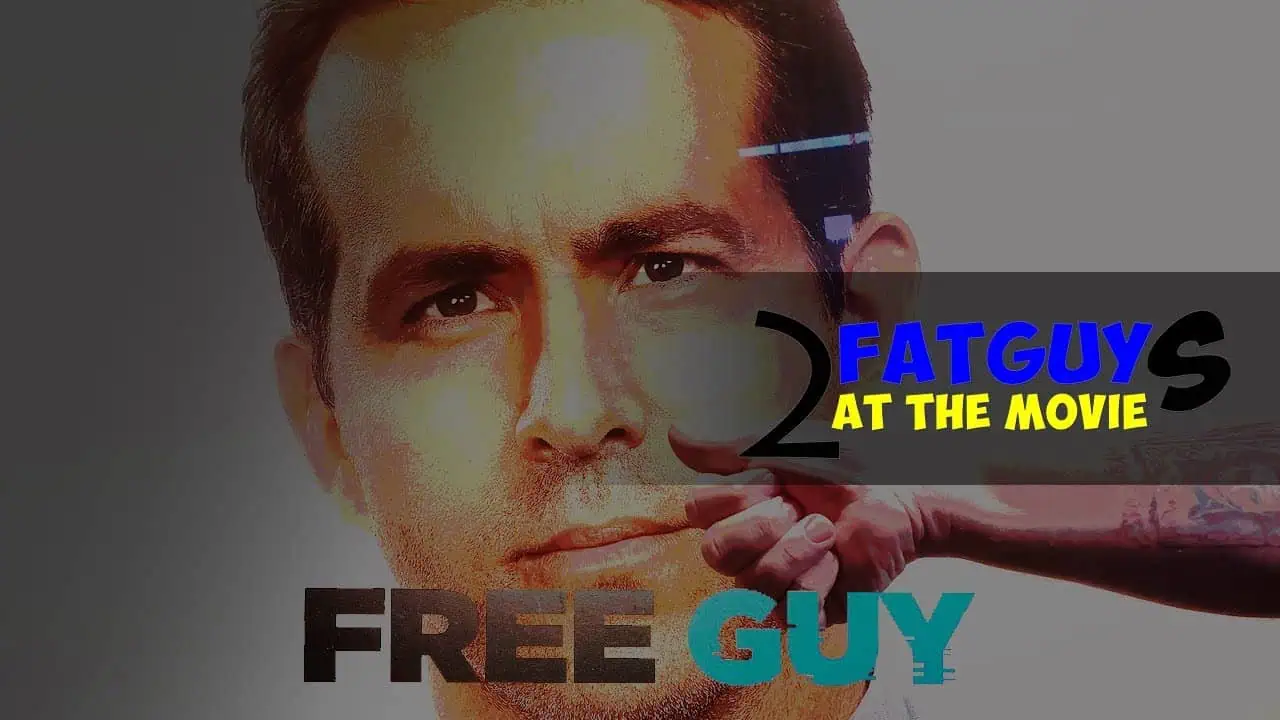 Close-up of a man in a blue shirt from Free Guy movie poster.