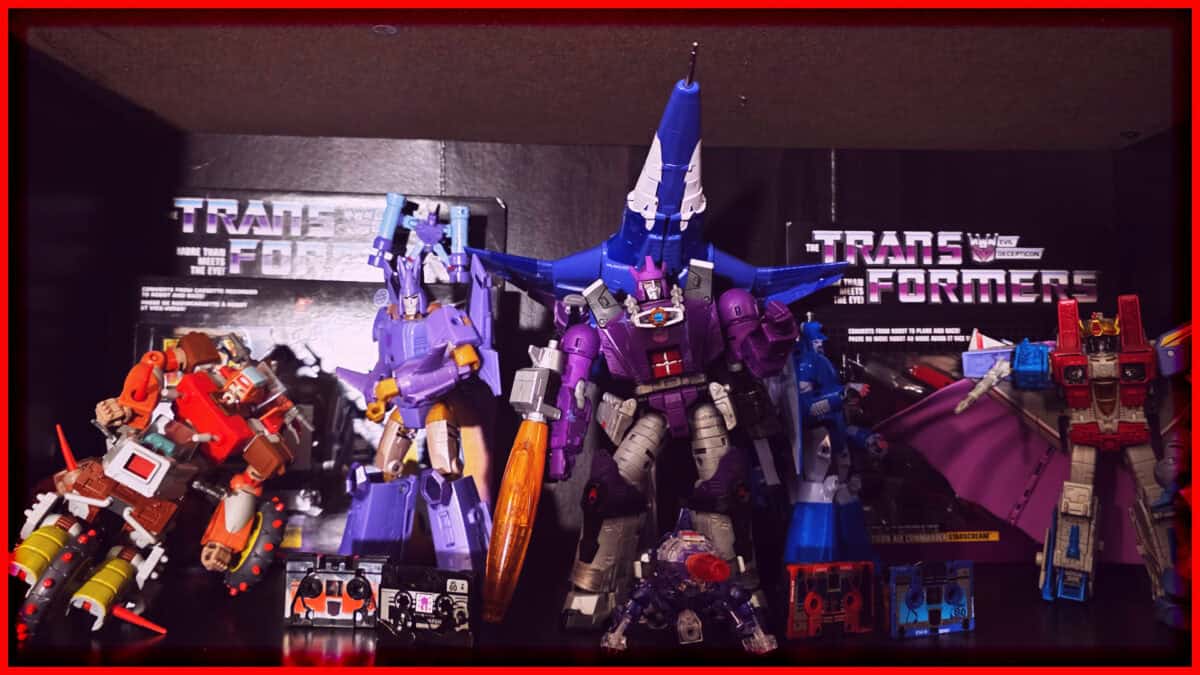 Collection of Transformers action figures on display shelf.