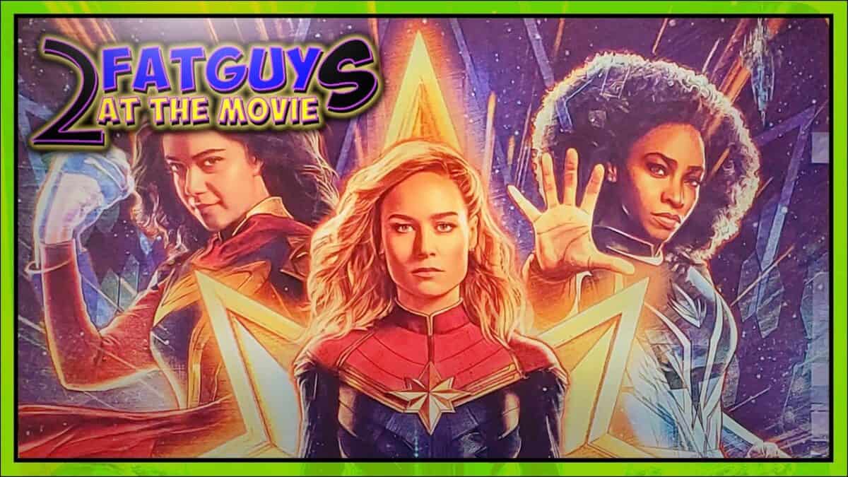 Movie poster for Fatguy at the Movie featuring three female characters in superhero costumes.