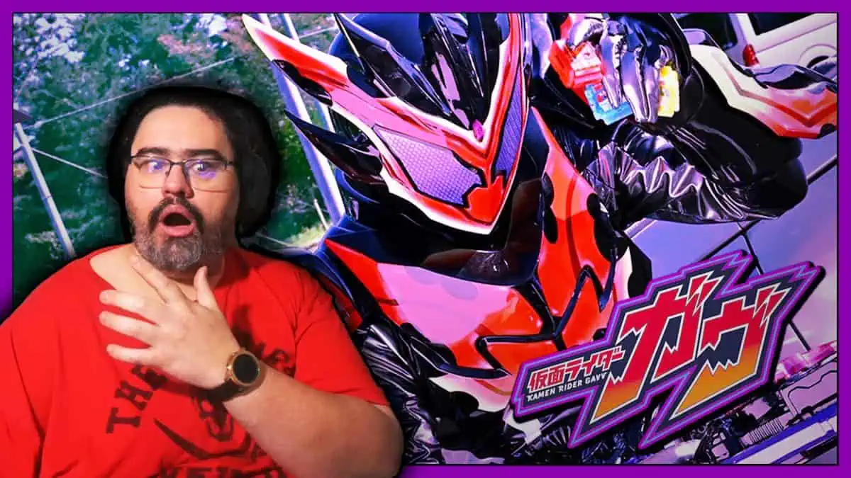 Excited man reacting to Majin Rider Kamen Rider OOO helmet display.