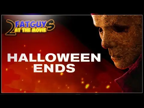 Promotional image for Halloween Ends with a masked character and fiery background.