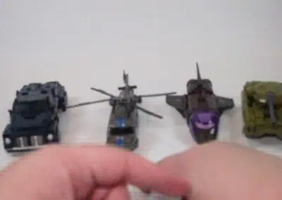 Age of the Primes Combaticon vehicles displayed together