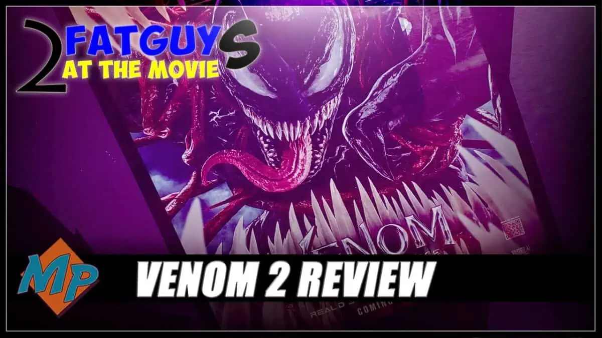 Venom 2 movie review poster featuring Venom's menacing face and sharp teeth.