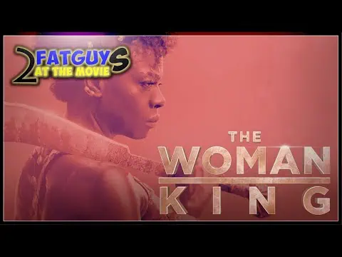 Promotional poster for The Woman King featuring a woman warrior with a spear.